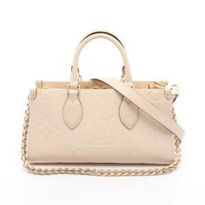Louis Vuitton On the Go Empreinte Cream Leather Handbag Ivory White